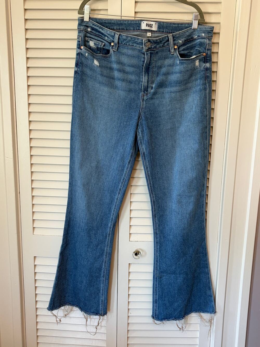 Paige women Highrise Laurel Canyon jeans 33 flare denim raw hem distressed blue